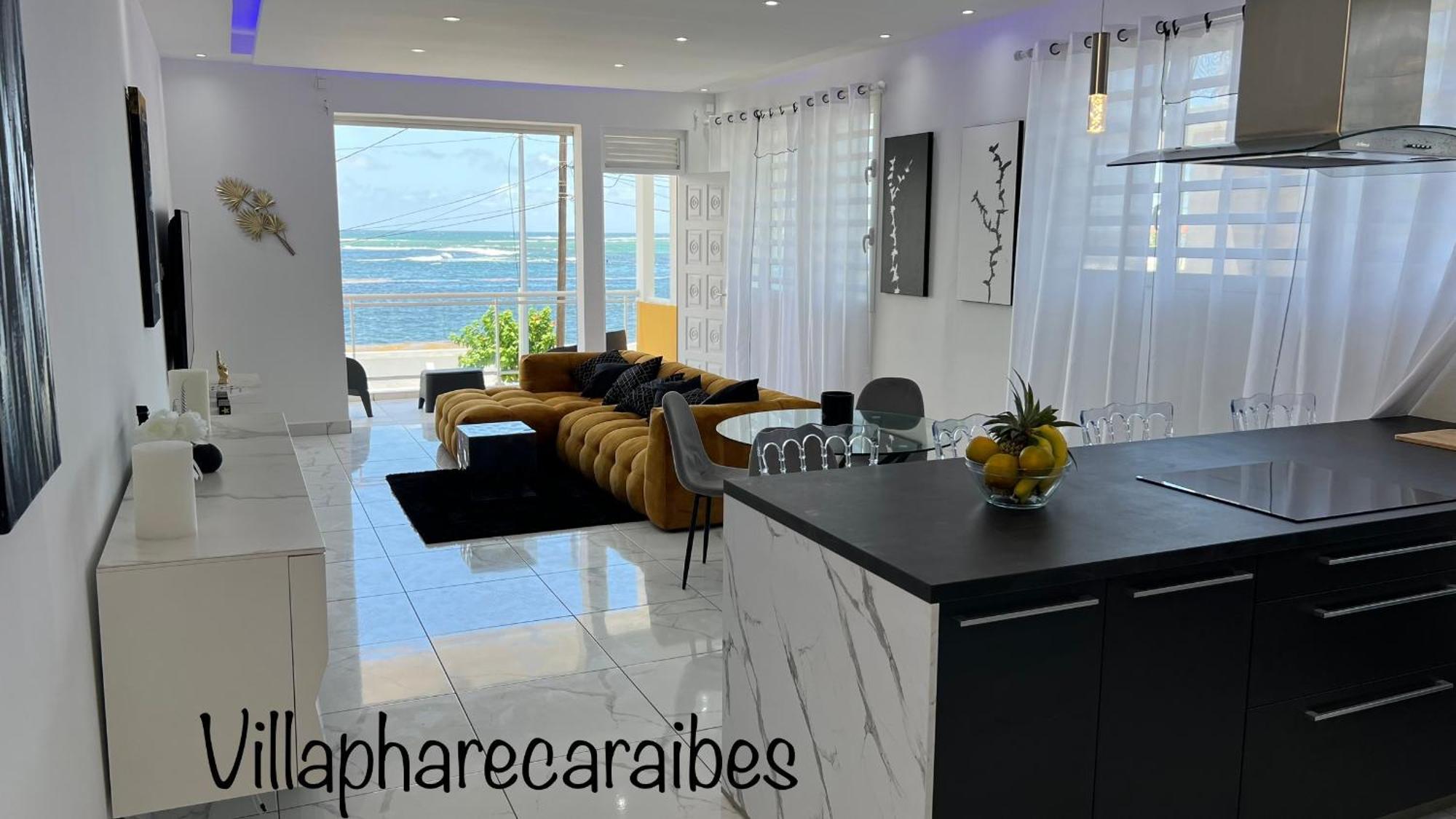 Villa Phare Caraibes Guadeloupe - Rooftop Jacuzzi & Ocean View لو مول المظهر الخارجي الصورة