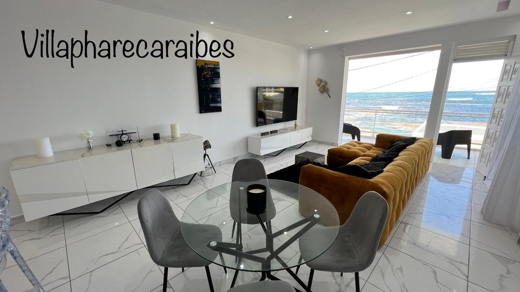 Villa Phare Caraibes Guadeloupe - Rooftop Jacuzzi & Ocean View لو مول المظهر الخارجي الصورة